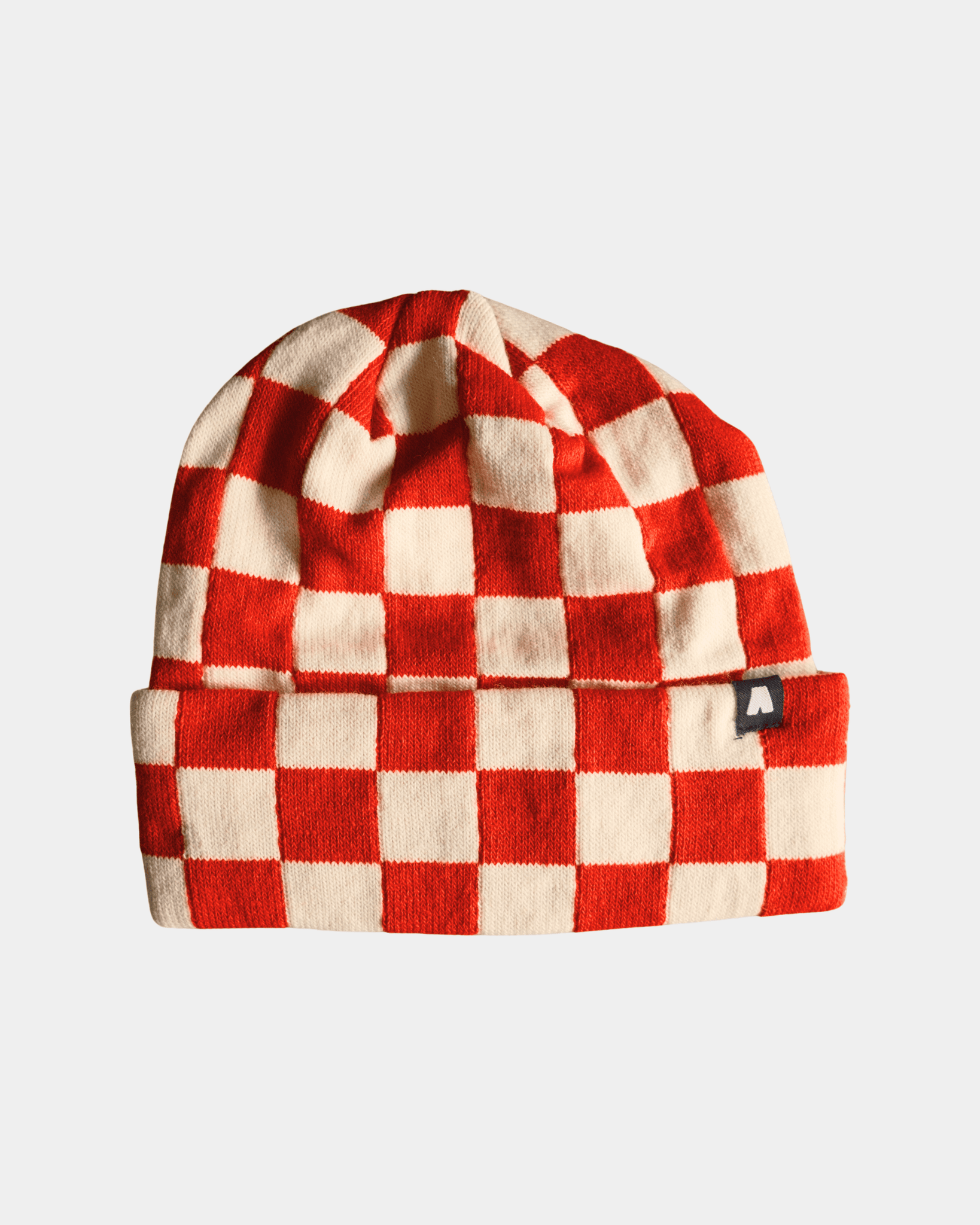 Bonnet avec revers, motif damiers, carreaux rouge et blanc, fabriqué au Portugal