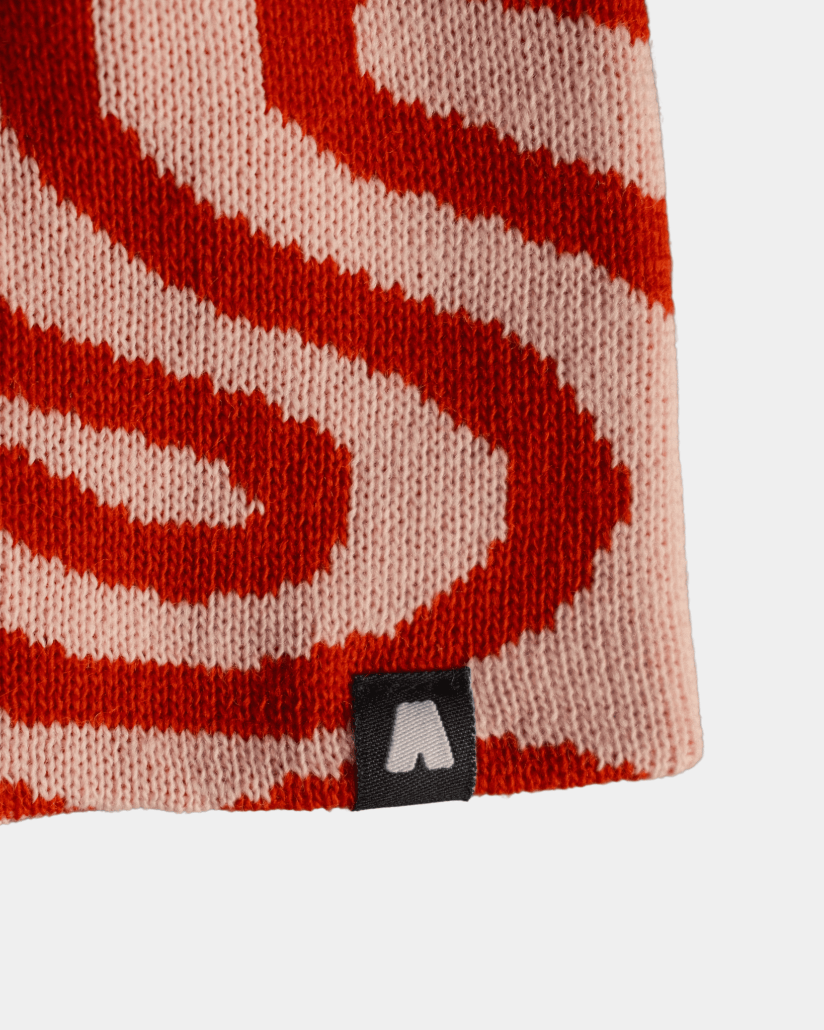 Bonnet sans revers, motif lava, rouge et rose, fabriqué au Portugal