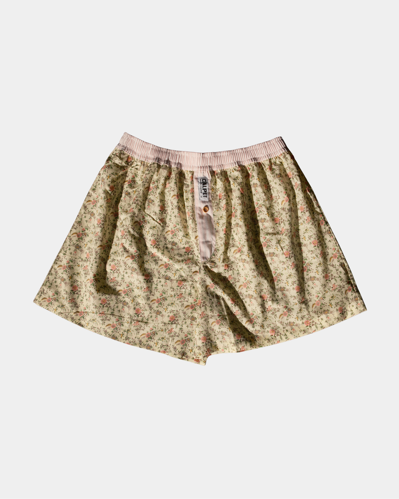 caleçon parachute fleuri CALPET, fond crème à petites fleurs roses et jaunes, coupe large et élastique rose pâle à rayures